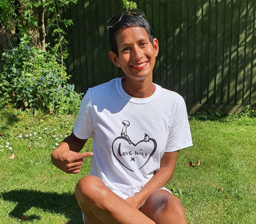 Naga Munchetty sitting inside her garden