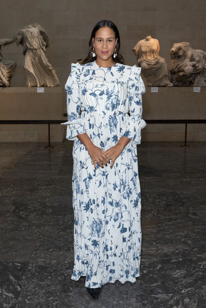 Zawe Ashton looked resplendent in a romantic blue floral gown, complete with statement earrings at the Erdem show.