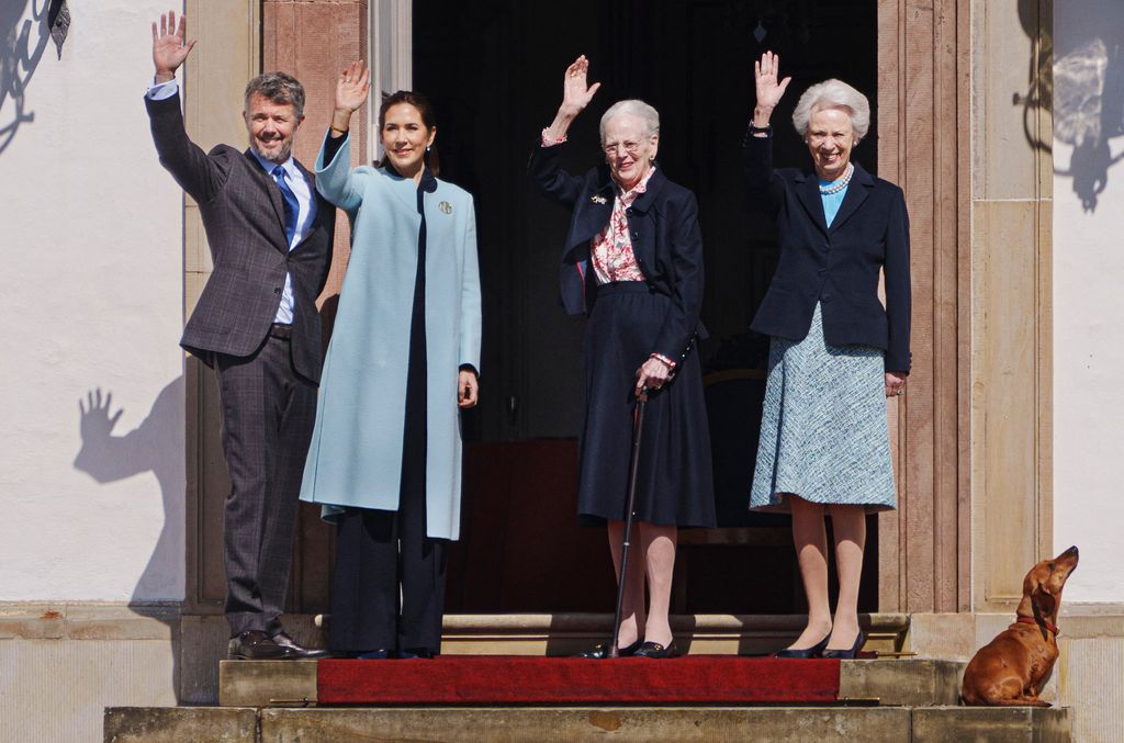 Queen Margrethe II  (2ndR) together with Denmark's Princess Benedikte (R), Queen Mary of Denmark and King Frederik X of Denmark wave to onlookers at Fredensborg Castle  ahead of festivities of Queen Margrethe's 84th birthday in Fredensborg, Denmark