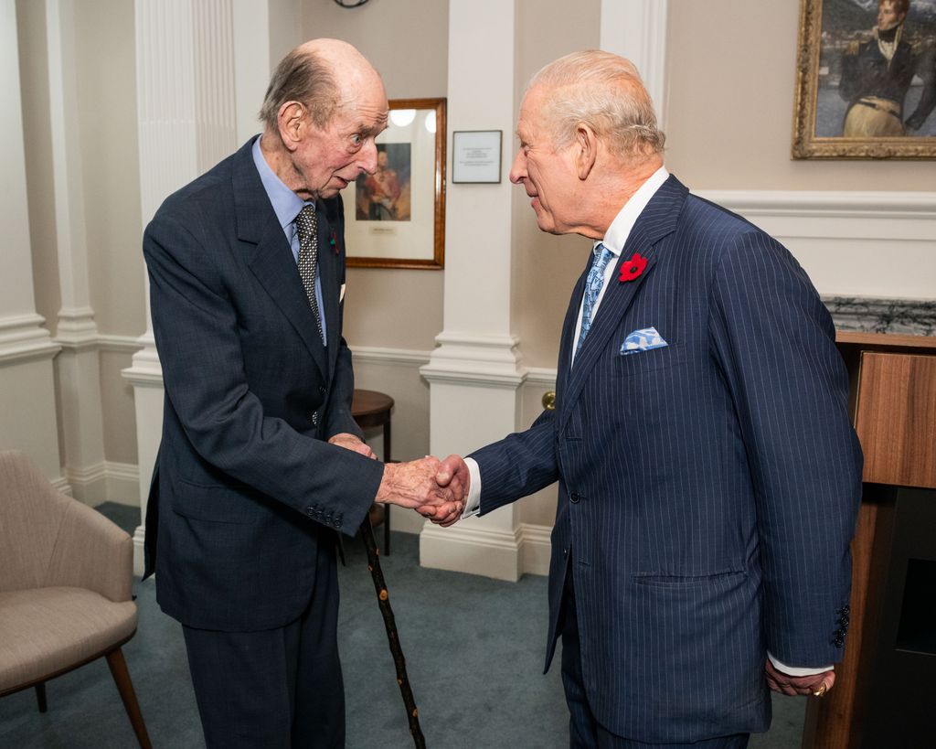 King Charles shaking hands with the Duke of Kent