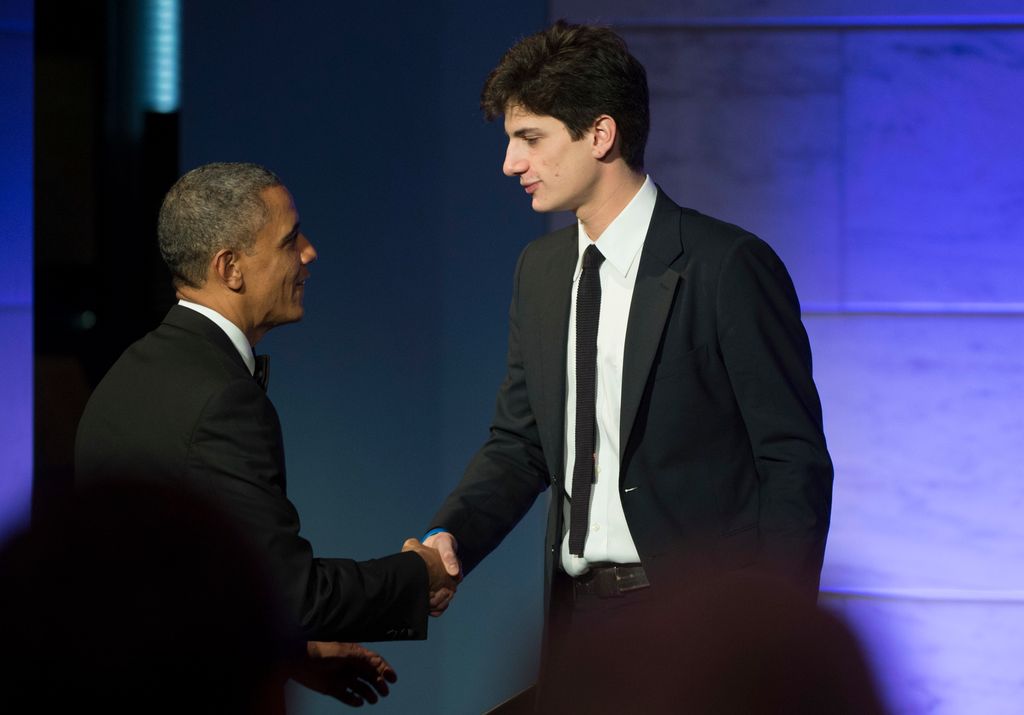 President Barack Obama shakes hands with Jack Schlossberg,