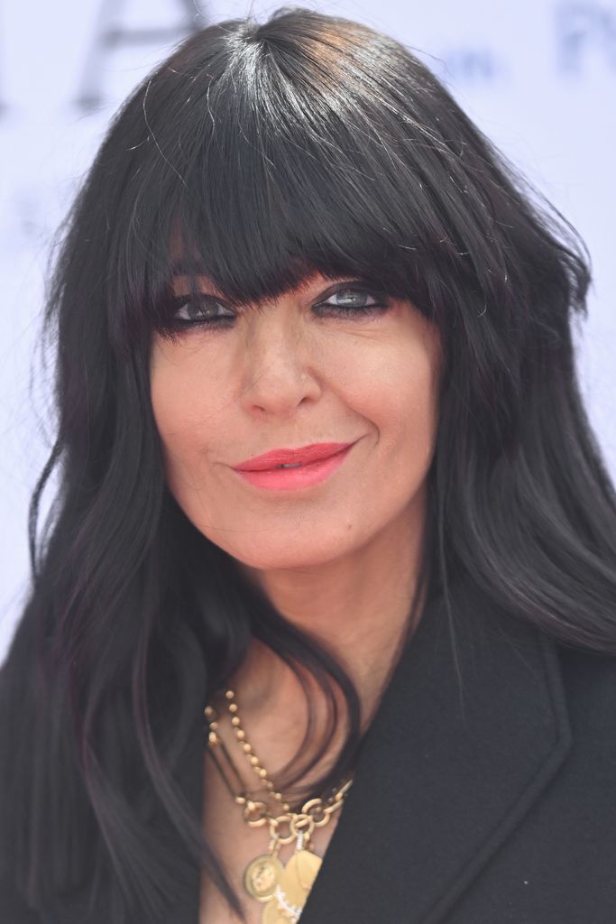 claudia winkleman at baftas in black suit