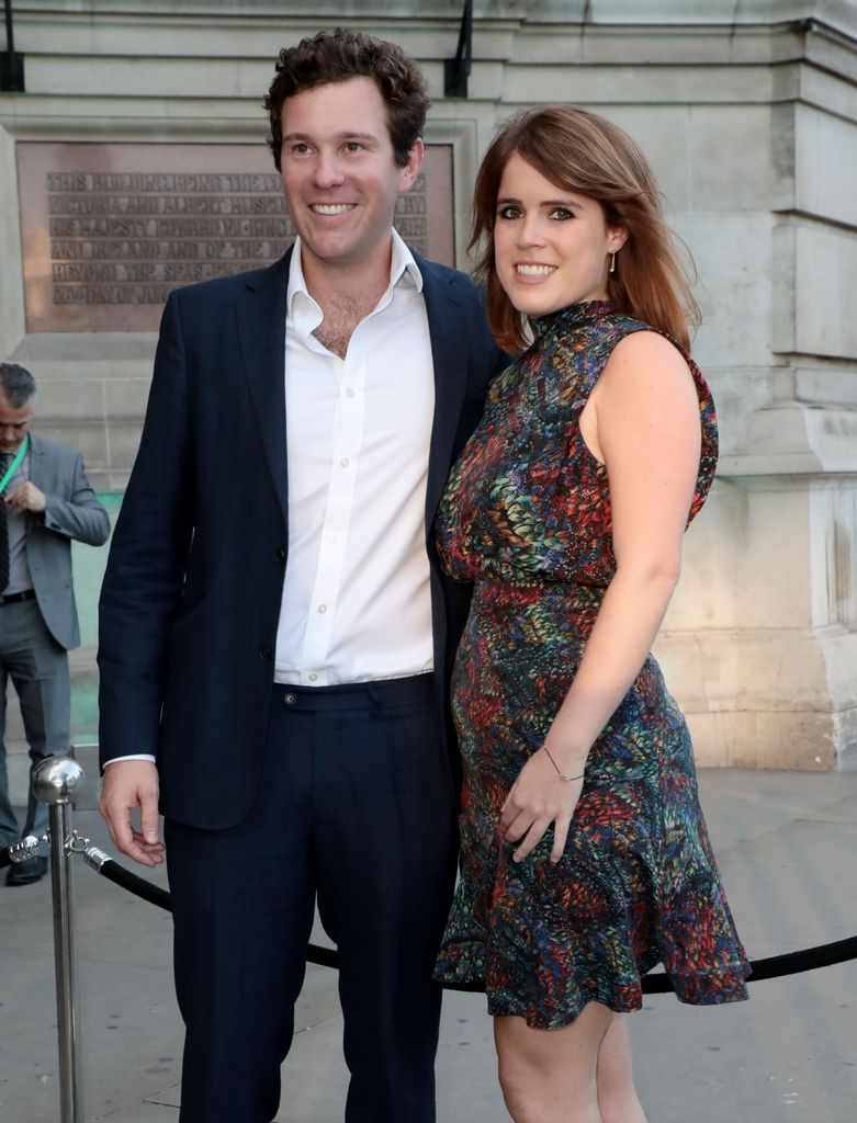 Jack Brooksbank in a suit and Princess Eugenie in a mini dress