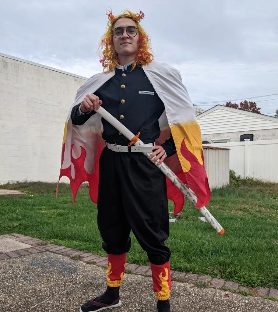 Brendon Scholl shares a photograph of their Halloween costume on Instagram, dressed as Rengoku Kyojuro