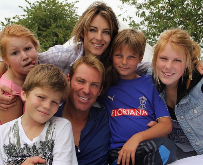 Damian Hurley as a child with Elizabeth Hurley and Shane Warne and three other children
