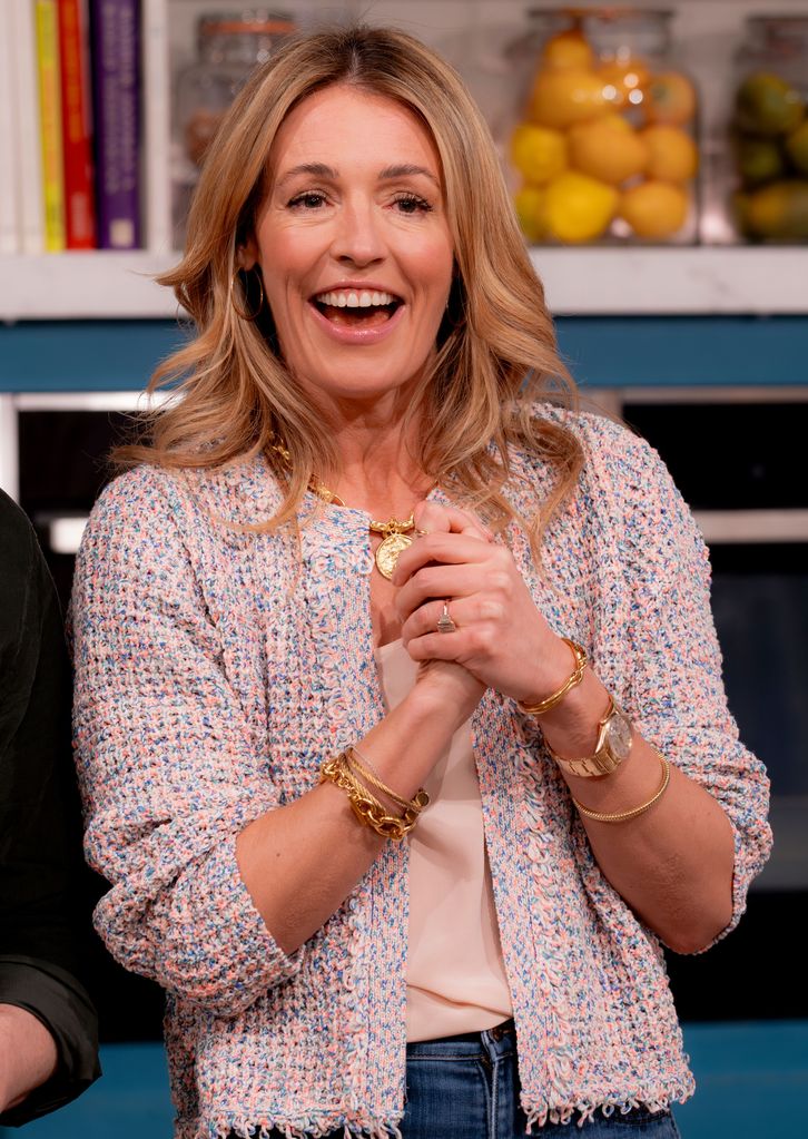 Cat Deeley teamed her cardigan with a satin camisole top and lots of gold jewellery