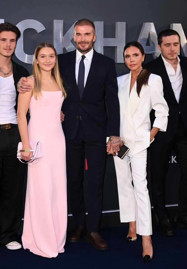 Harper wore a pastel pink gown with straight hair at a red carpet event alongside her family. Her soft, glamorous look blended seamlessly with the rest of the well-dressed Beckhams.