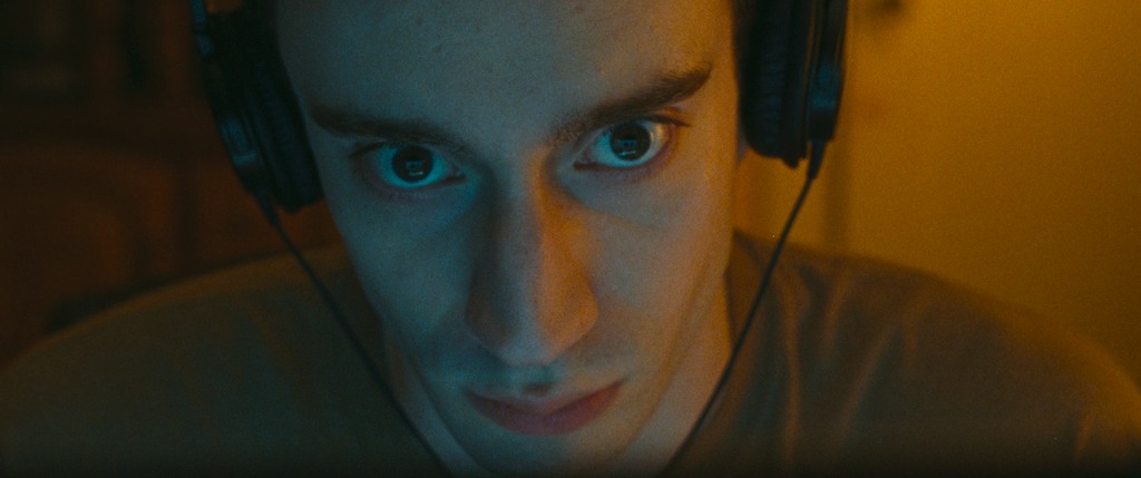 close-up of man wearing headphones