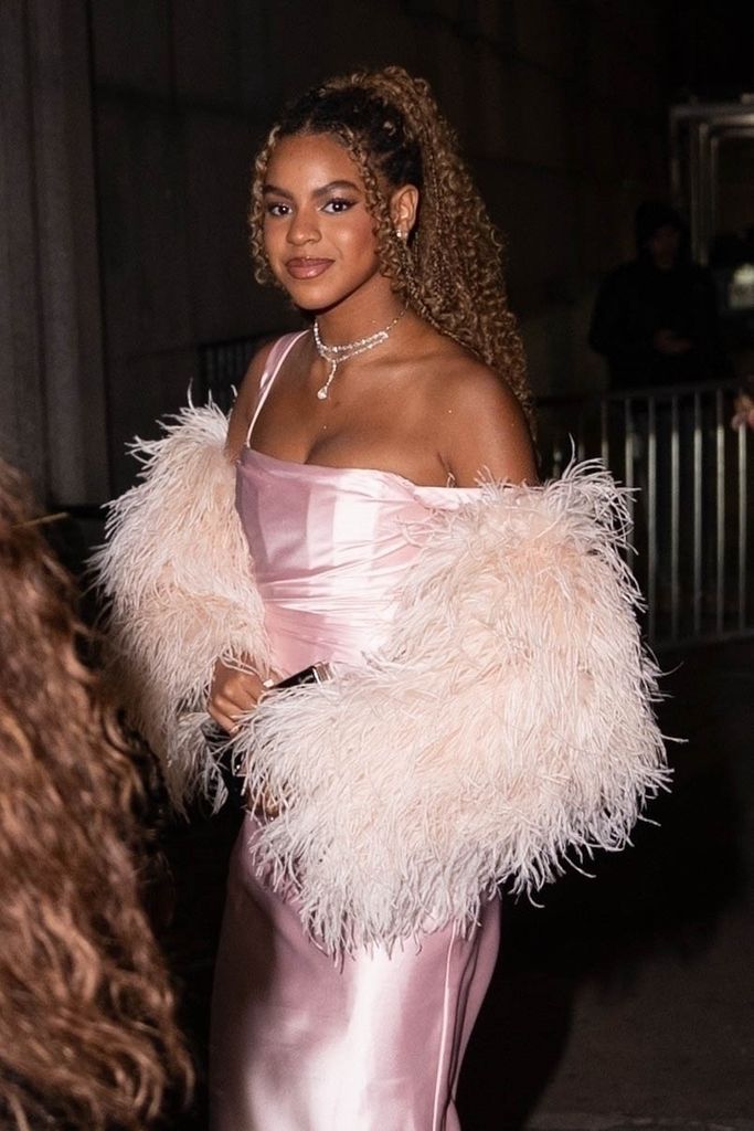 Blue Ivy Carter in a baby pink dress
