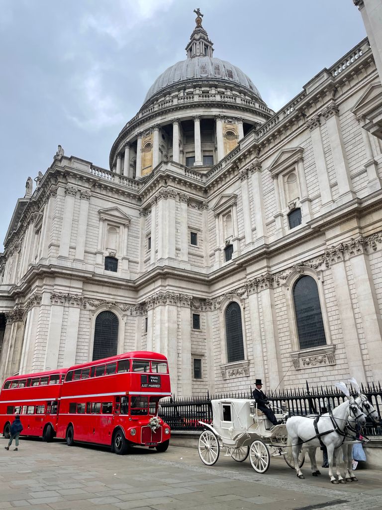 Wedding buses and horse-drawn carriage outside St Paul's Cathedral
