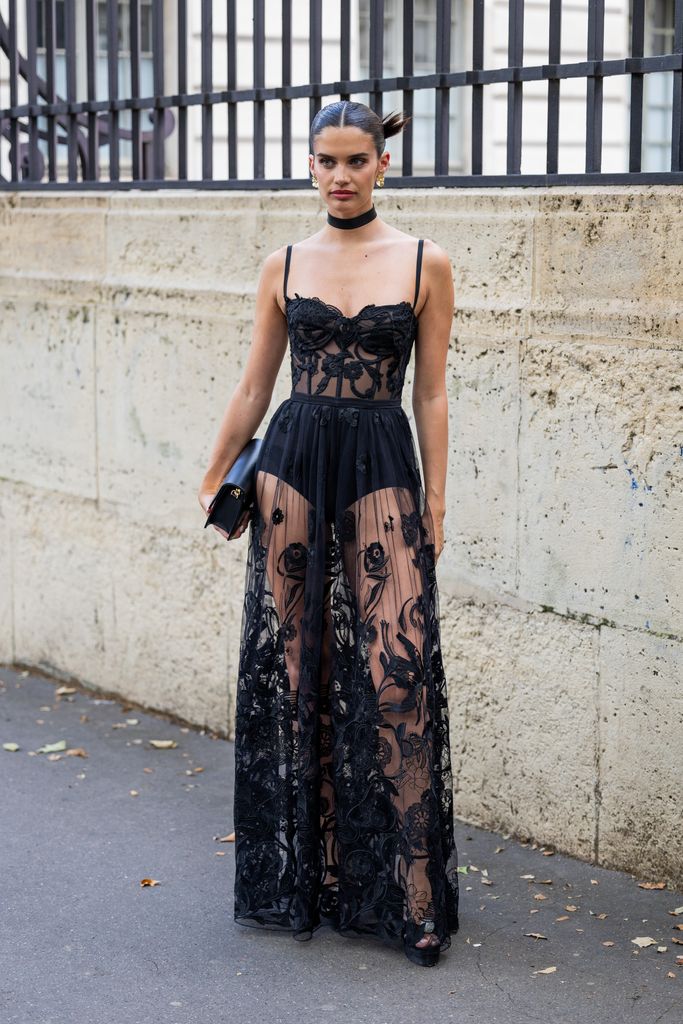 PARIS, FRANCE - JULY 05: Sara Sampaio is seen wearing black laced dress outside Zuhair Murad during the Haute Couture Fall/Winter 2023/2024 as part of  Paris Fashion Week on July 05, 2023 in Paris, France. (Photo by Christian Vierig/Getty Images)