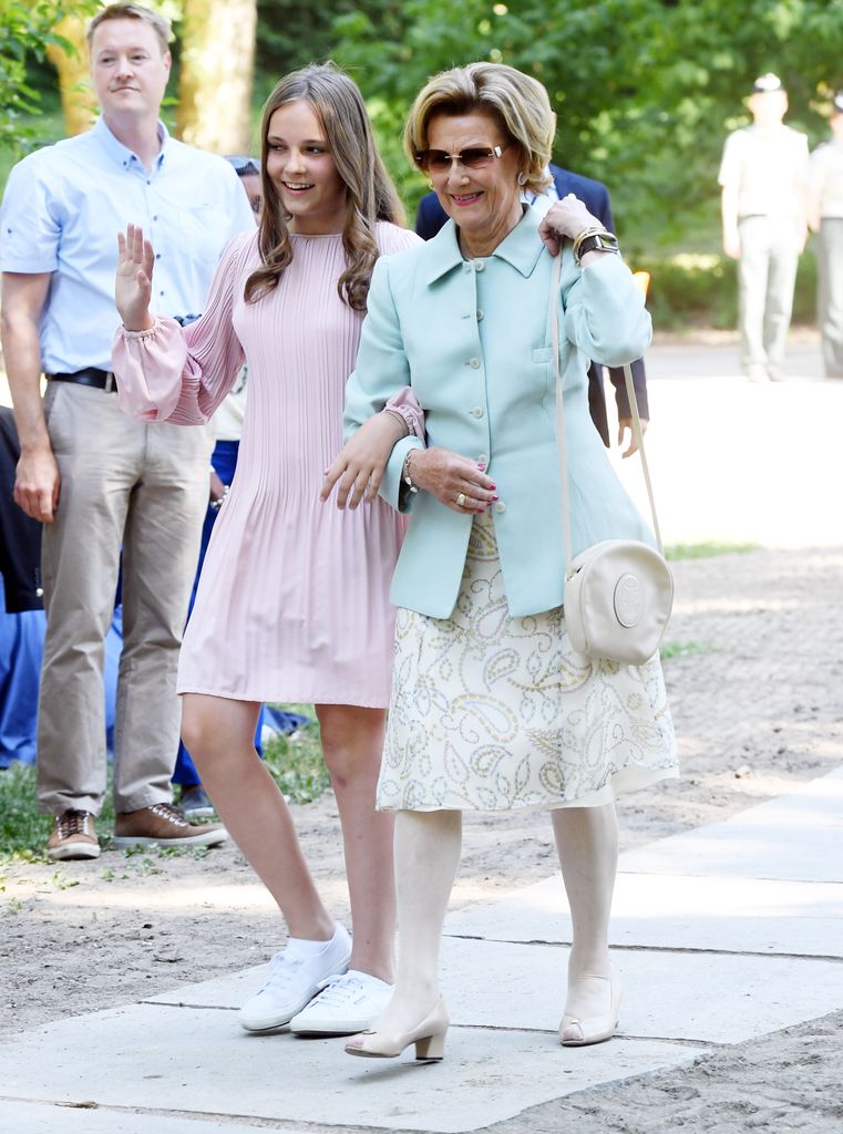 Queen Sonja links arms with granddaughter Princess Ingrid Alexandra in 2018