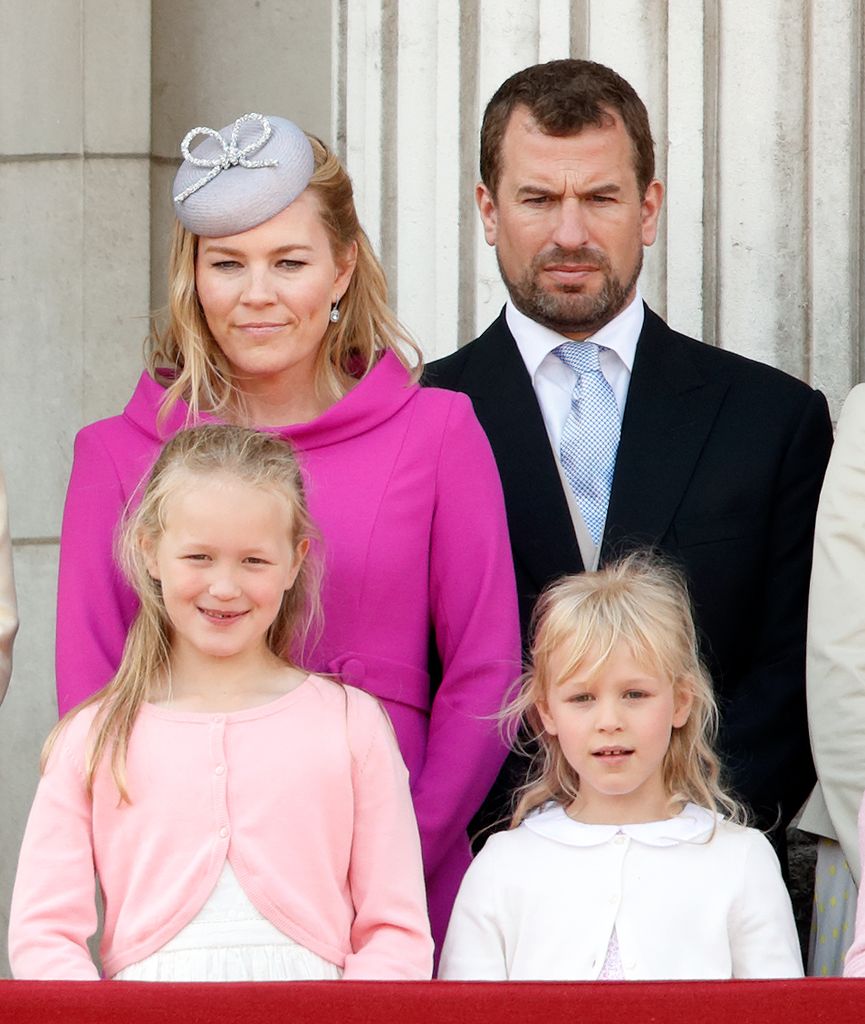 Peter Phillips with Autumn Phillips, Savannah Phillips and Isla Phillips on Buckingham Palace balcony