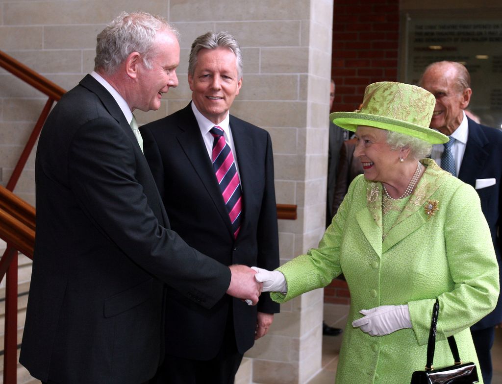 Queen Elizabeth II shakes hands with Deputy First Minister of Northern Ireland Martin McGuinness