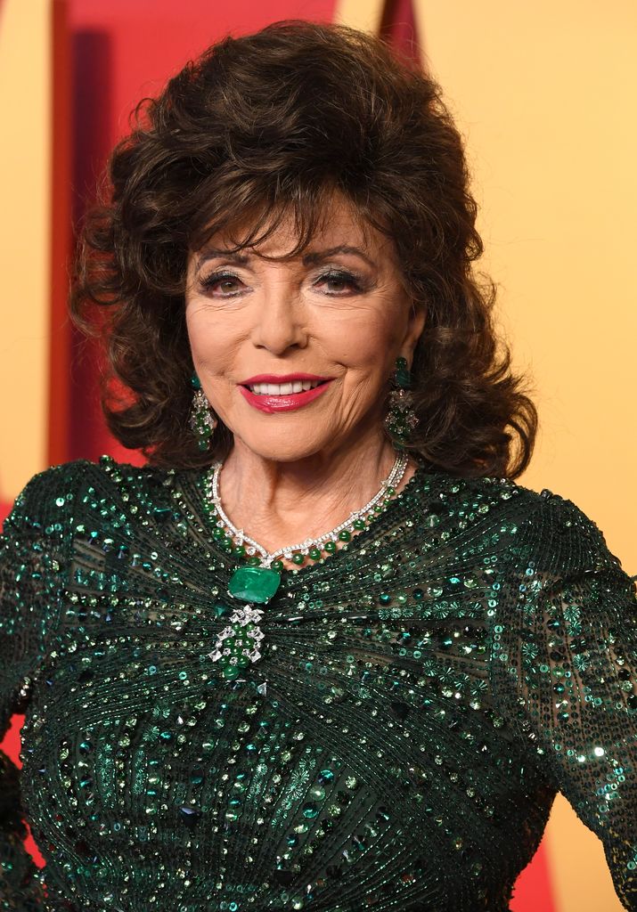 joan collins in green glitter dress at vanity fair oscars