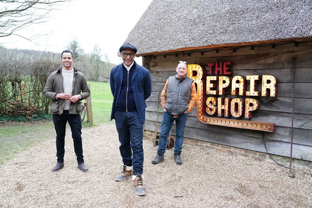 Will Kirk, Jay Blades and Steve Fletcher by The Repair Shop barn