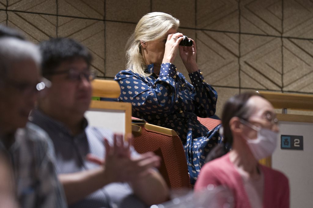 A photo of Duchess Sophie using binoulcars