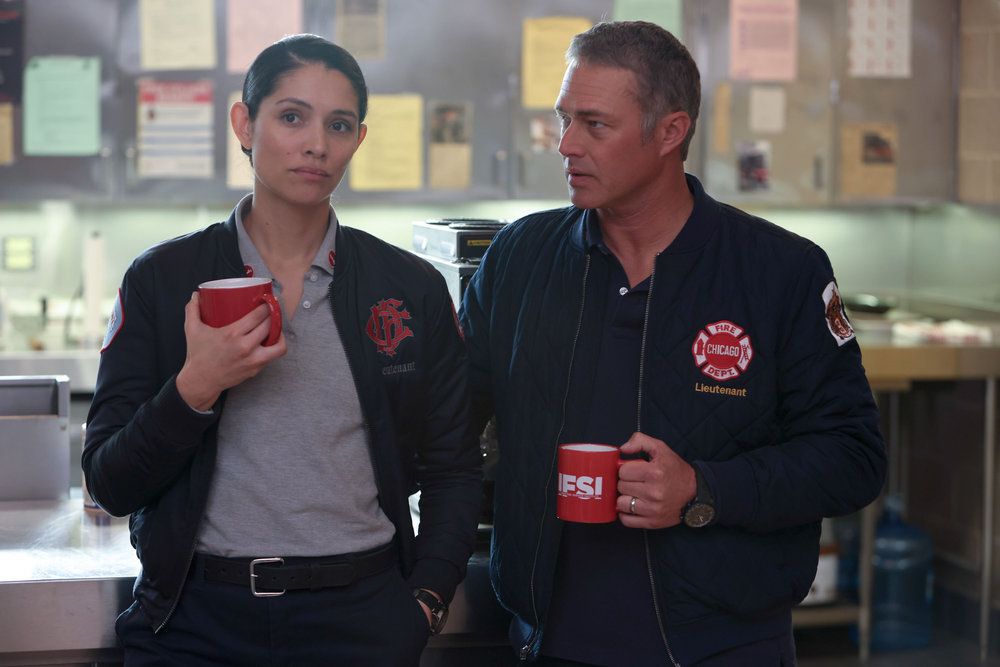 Miranda Rae Mayo as Stella Kidd, Taylor Kinney as Kelly Severide in Chicago Fire