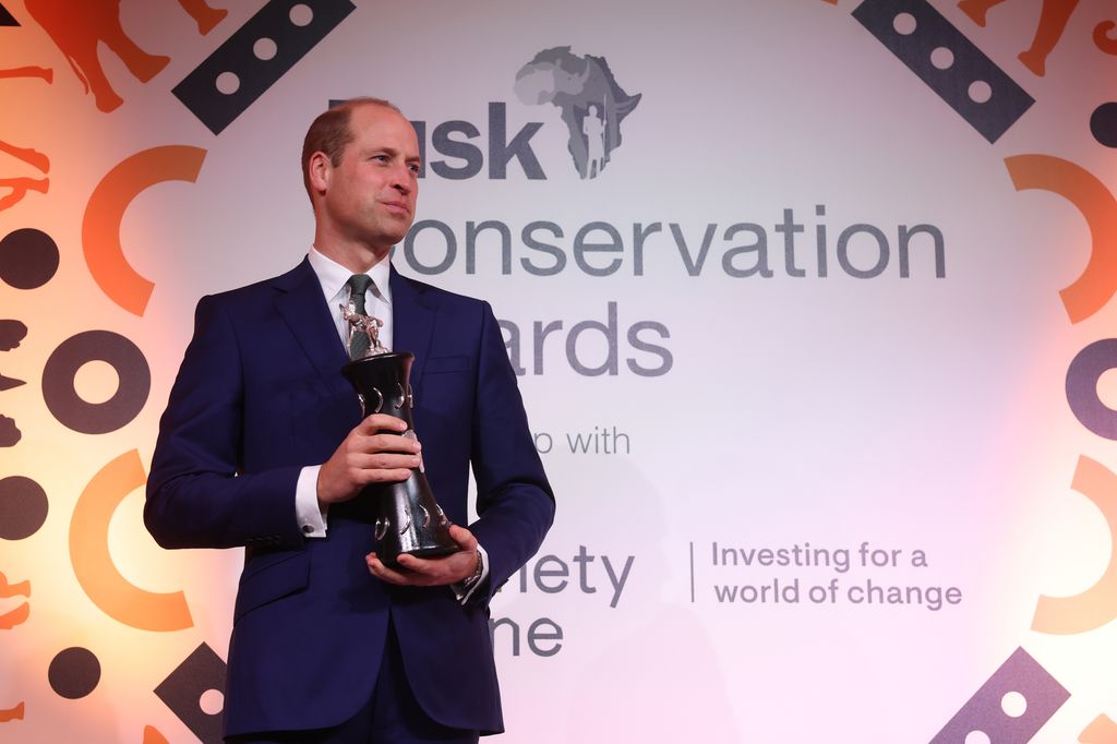 Prince William holding a Tusk Award