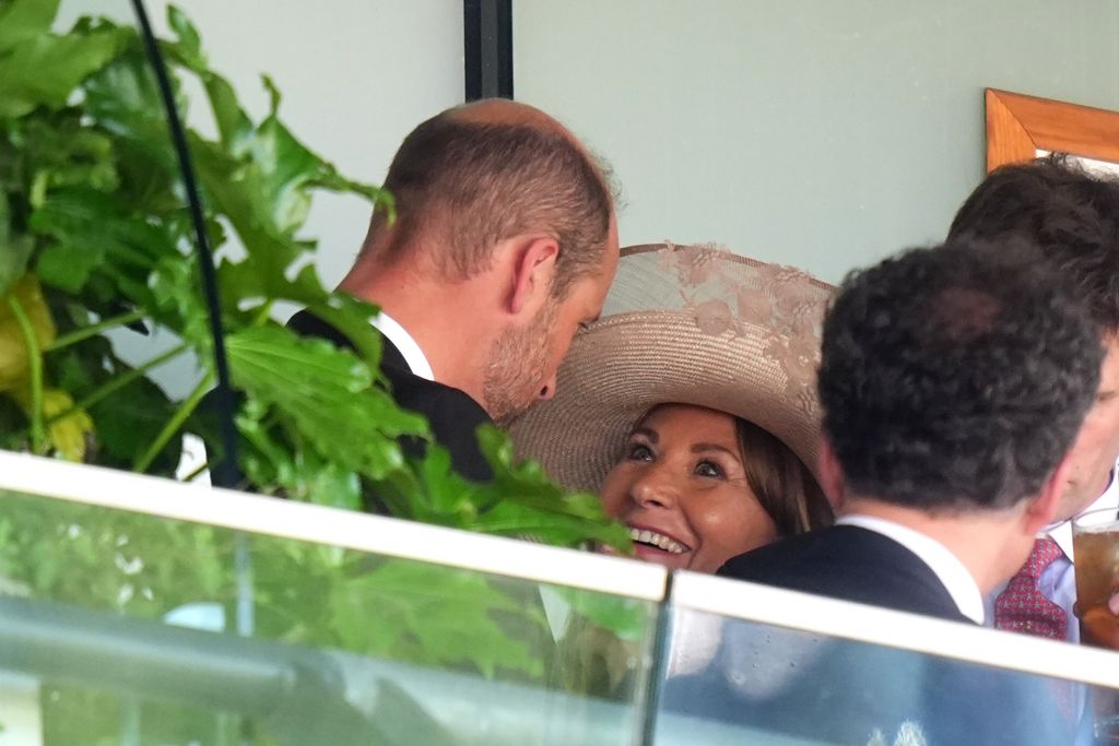 The Prince of Wales greets Carole Middleton