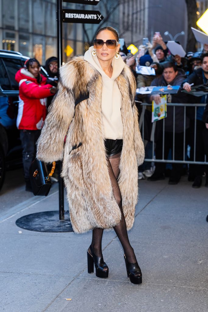  Jennifer Lopez in micro shorts and fur jacket