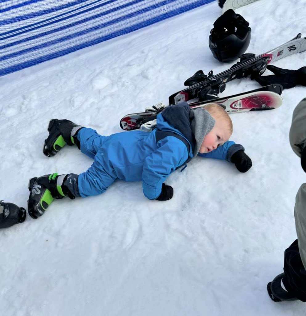 Photo shared by Dylan Dreyer on Instagram February 2024 of her youngest son Rusty lying in the snow after his first attempt at skiing.