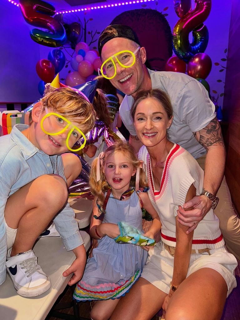 ronan Keating wearing silly glasses with wife, son and daughter