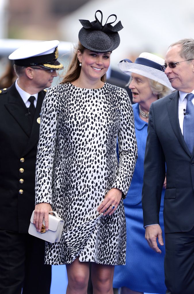 Catherine in dalmatian print dress smiling