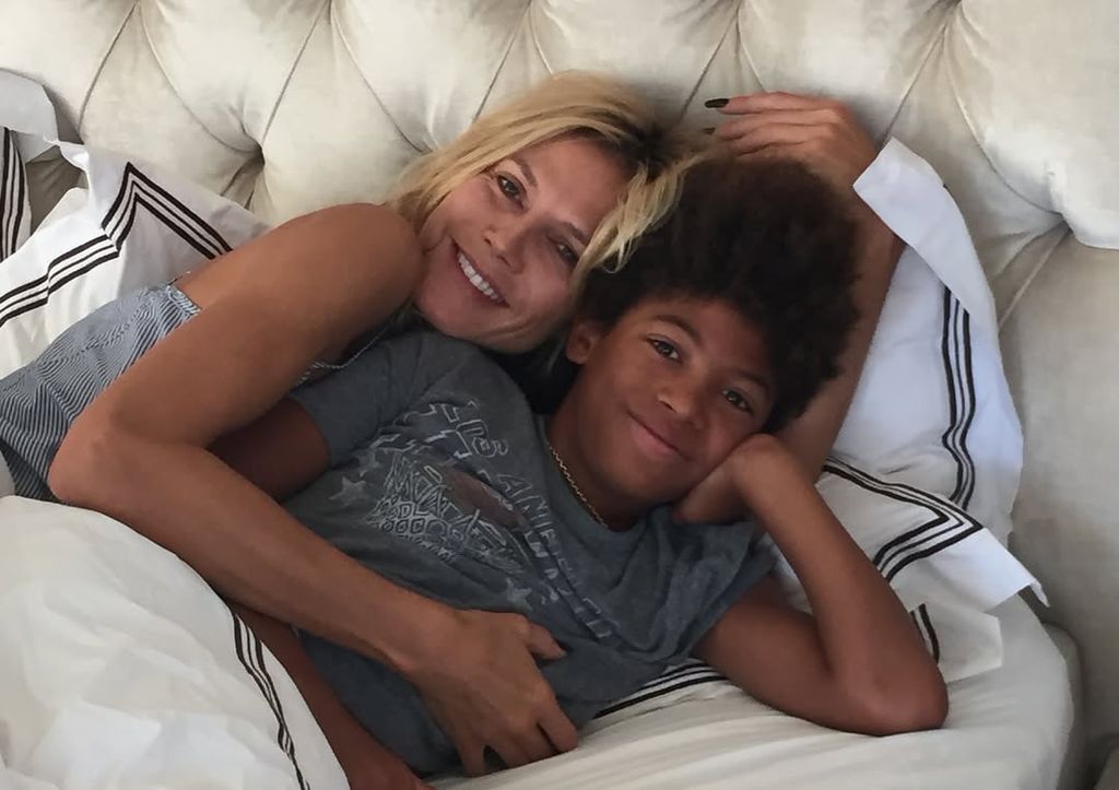 Heidi Klum cuddling Henry in bed