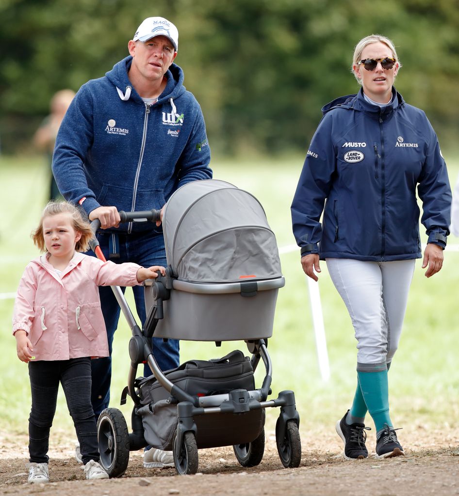 STROUD, UNITED KINGDOM - SEPTEMBER 09: (EMBARGOED FOR PUBLICATION IN UK NEWSPAPERS UNTIL 24 HOURS AFTER CREATE DATE AND TIME) Mike Tindall and Zara Tindall with their daughters Mia Tindall and Lena Tindall (in her pram) attend day 3 of the Whatley Manor Horse Trials at Gatcombe Park on September 9, 2018 in Stroud, England. (Photo by Max Mumby/Indigo/Getty Images)