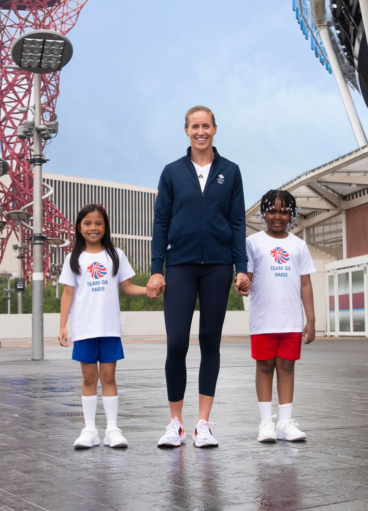 Helen Glover standing with two children