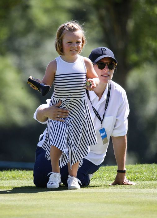 zara tindall and daughter mia cheer on mike at golf