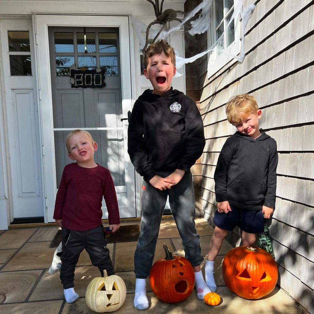 Dylan shared a photo of her sons proudly posing with their pumpkin creations