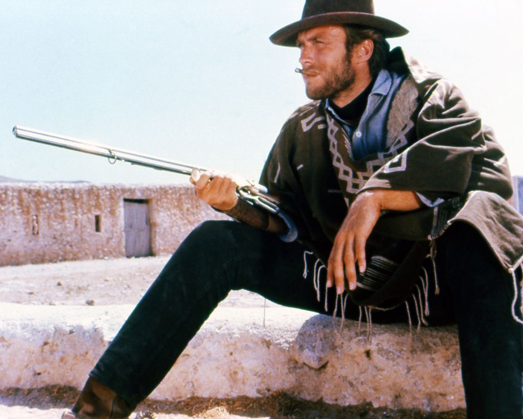 Clint Eastwood smoking a cigar in A Fistful of Dollars