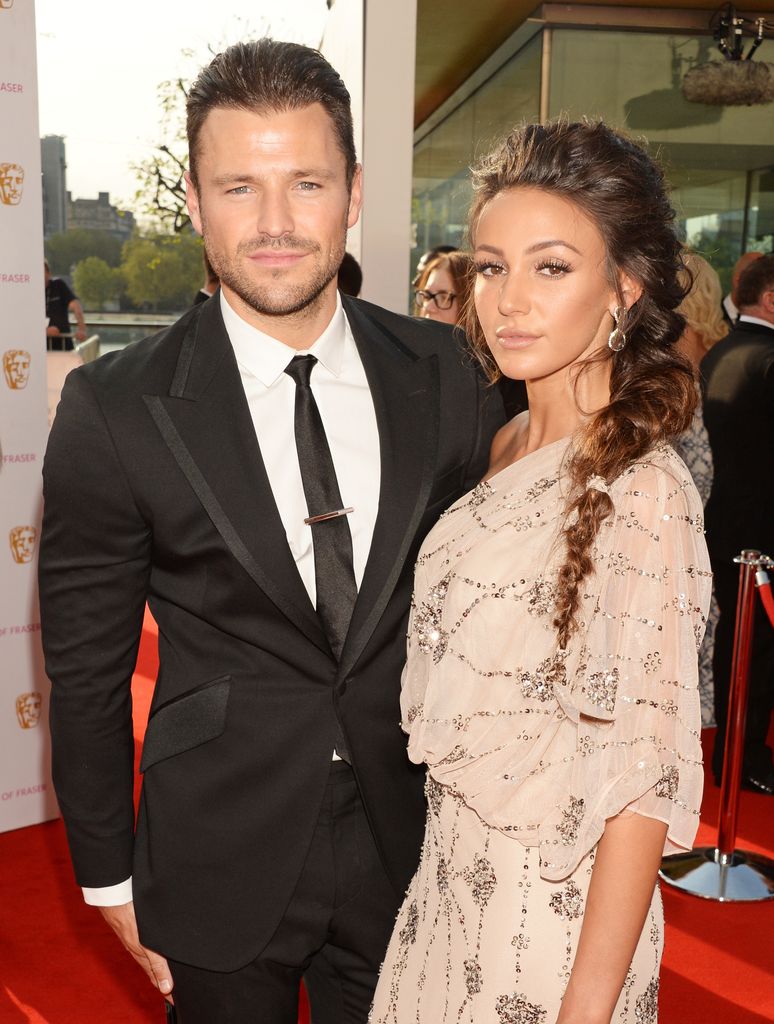 Michelle Keegan looking glum in a sparkly dress with her husband Mark Wright at the British Academy Television Awards 2016 