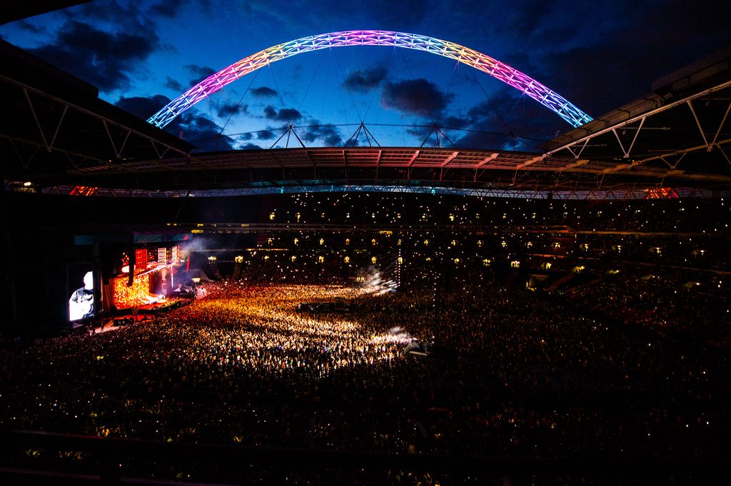 Ed Sheeran performing at Wembley Stadium