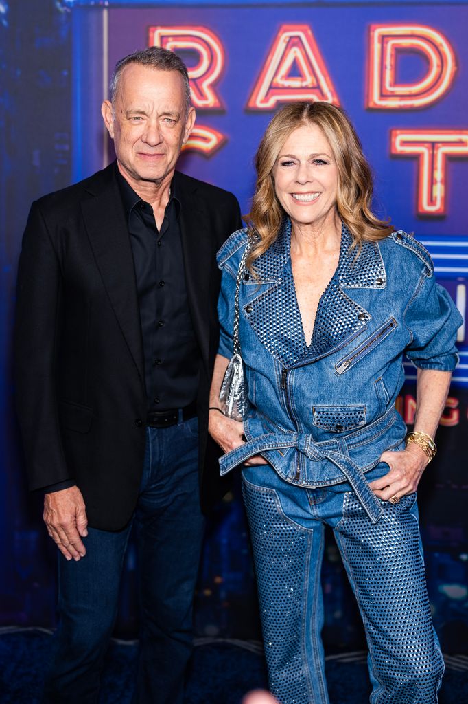 Tom Hanks (L) and Rita Wilson stood next to each other smiling
