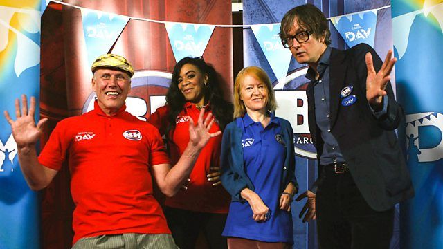 Two people in red t-shirts next to two people in blue t-shirts