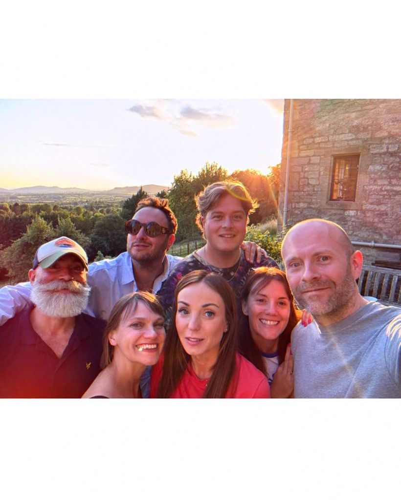 group of friends posing for selfie