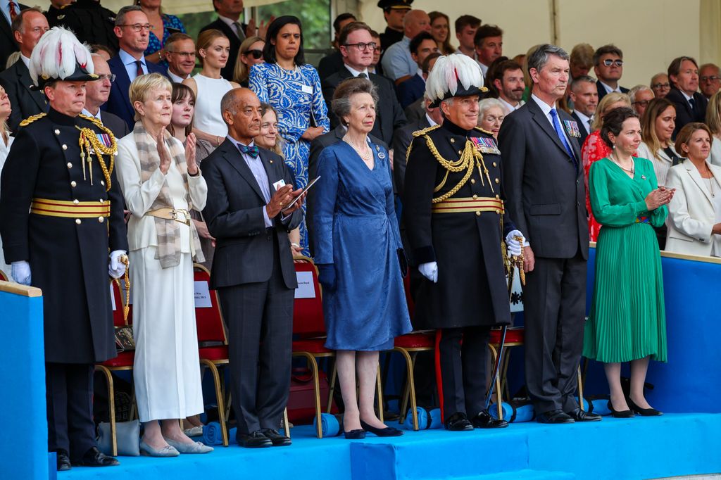 Anne, Princess Royal standing in line up of people