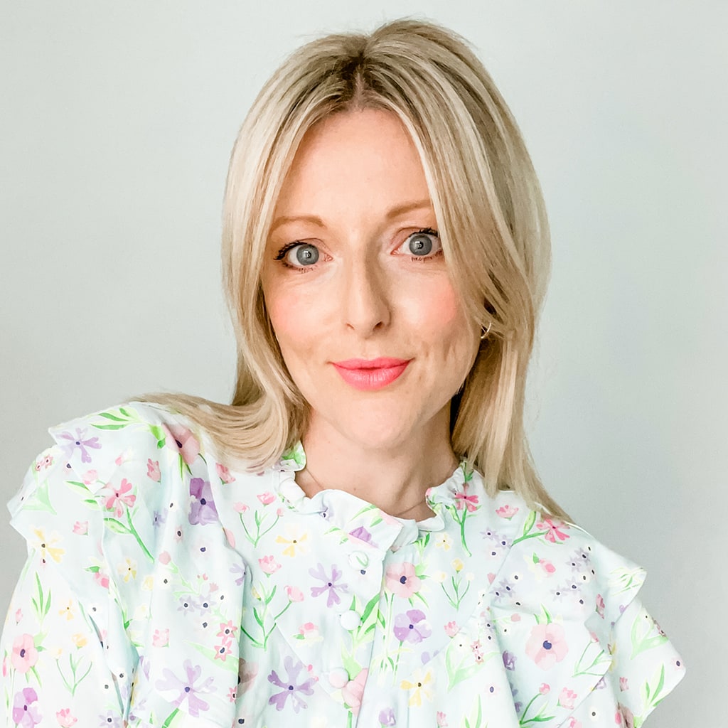 blonde lady in floral top