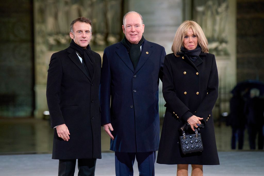 Prince albert posing with Macron and his wife Brigitte 