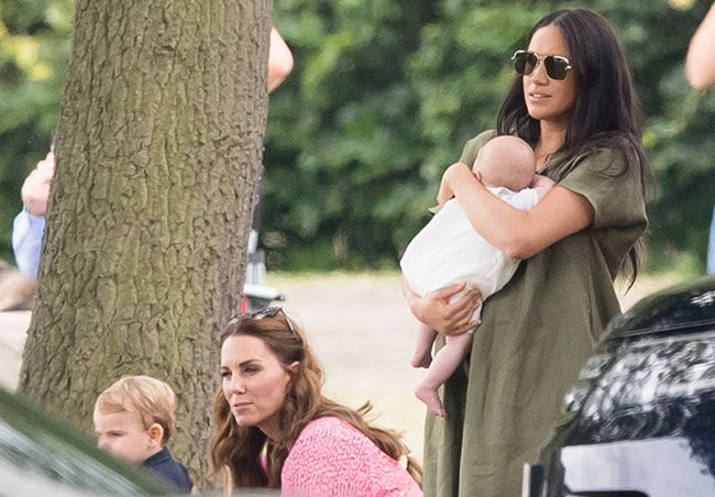 Meghan and baby Archie next to Kate and Prince Louis