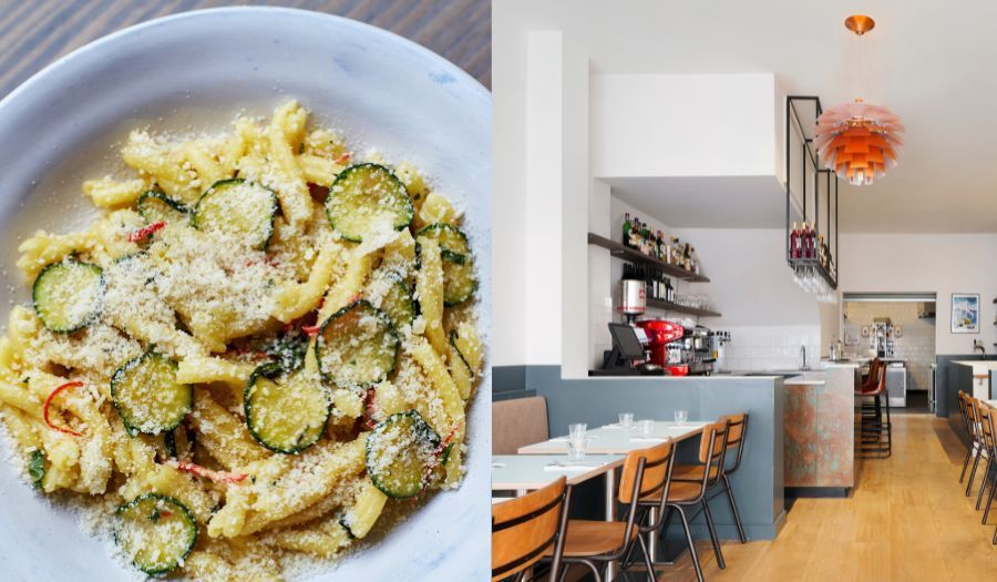 pasta on plate beside photo of restaurant inside