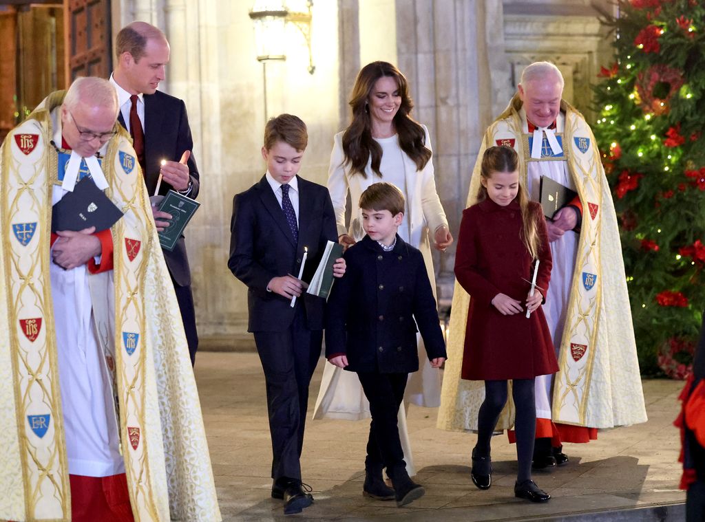 Catherine, Princess of Wales, Prince Louis of Wales, Princess Charlotte of Wales, Prince William, Prince of Wales and Prince George of Wales process out of The 'Together At Christmas' Carol Service at Westminster Abbey on December 08, 2023 