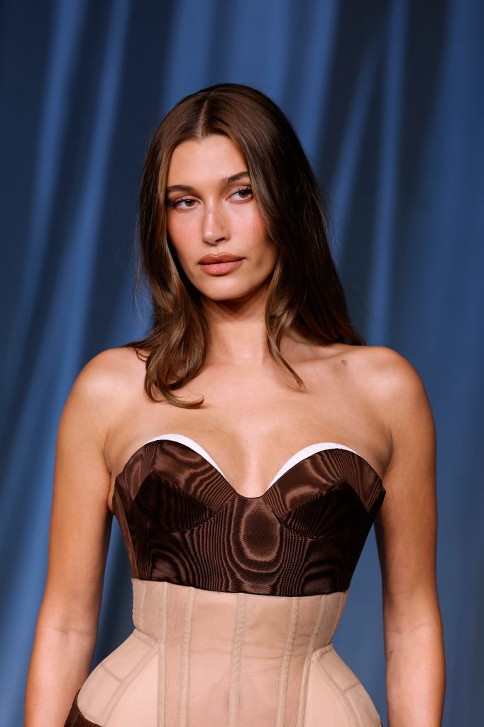 Hailey Bieber in brown corset dress
