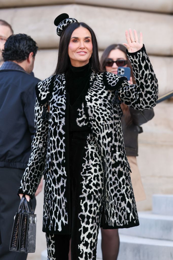 Demi in cheetah-print blazer and matching pants