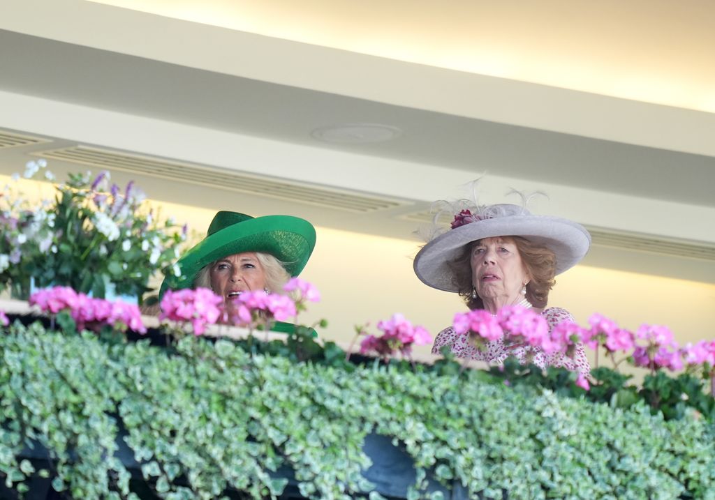 Queen Camilla and Lady Sarah Keswick watch the Queen Mary Stakes