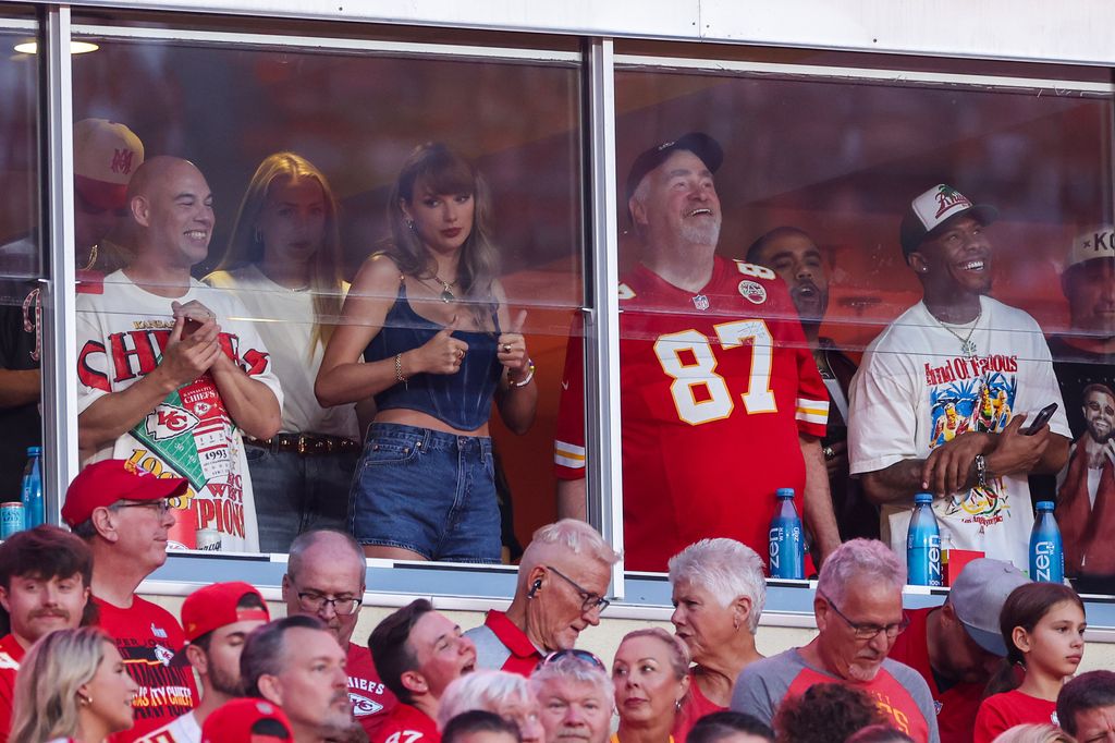 Taylor Swift and Ed Kelce enjoying the game together