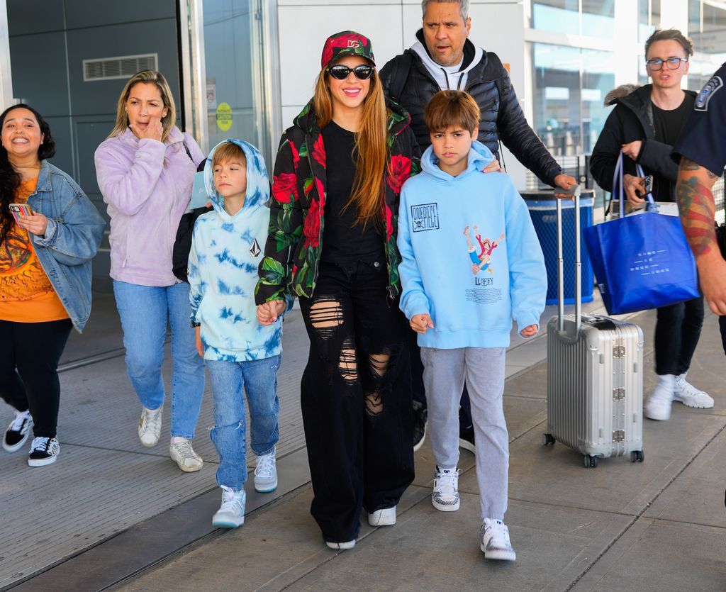 Sasha Pique Mebarak, Shakira and Milan Pique Mebarak are seen at JFK Airport on March 9, 2023 in New York City